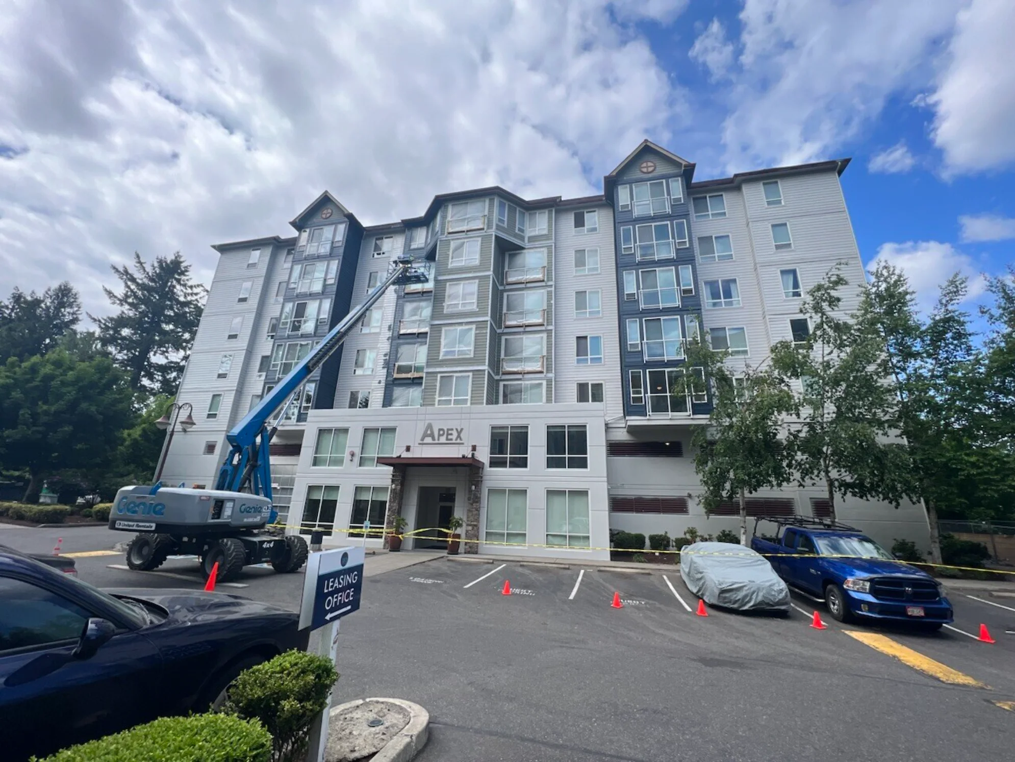 Exterior painting and metal repair at multifamily building
